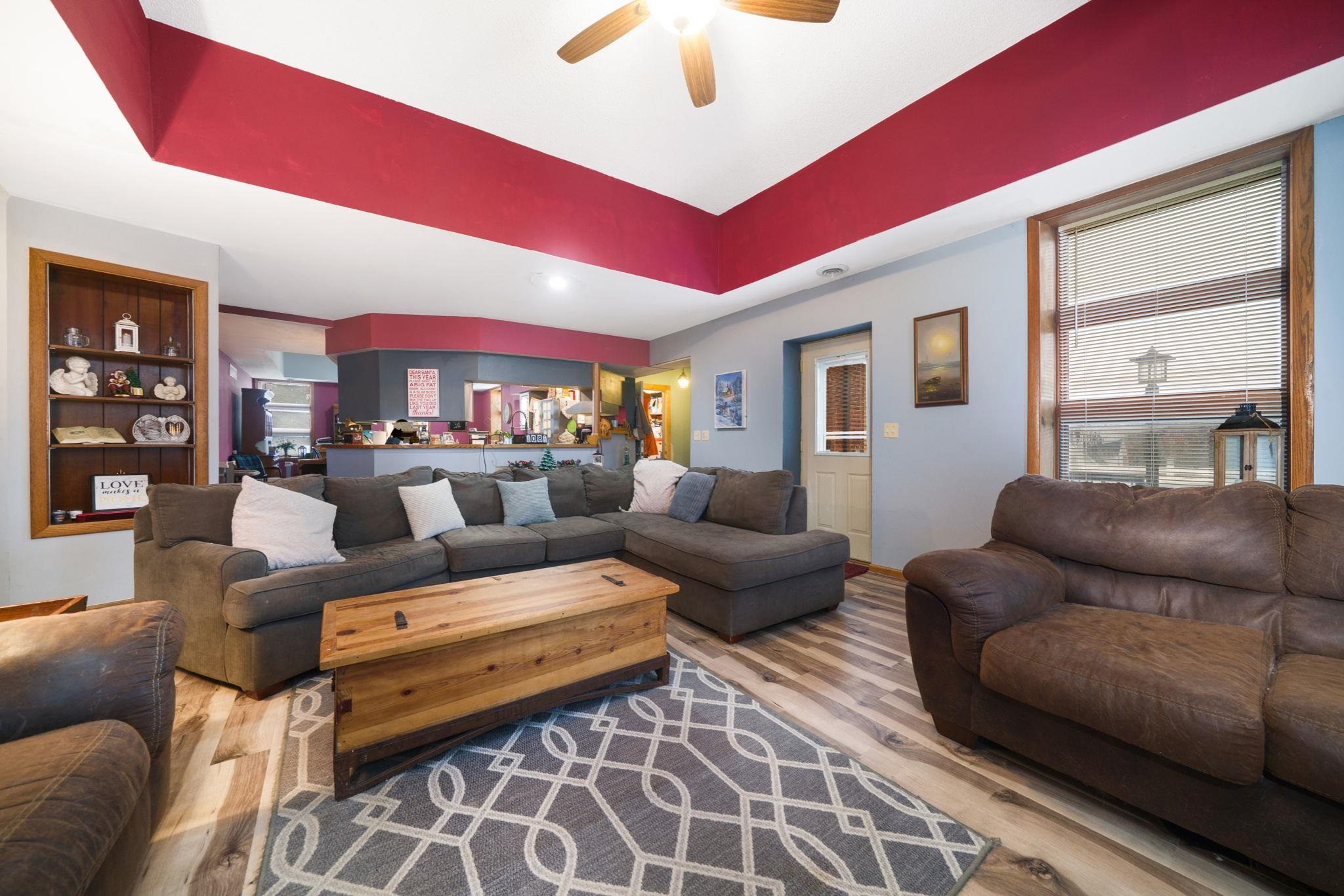 709 Franklin Street Oregon, IL 61061 - Photo 7 of 87 a living room with furniture and a large window
