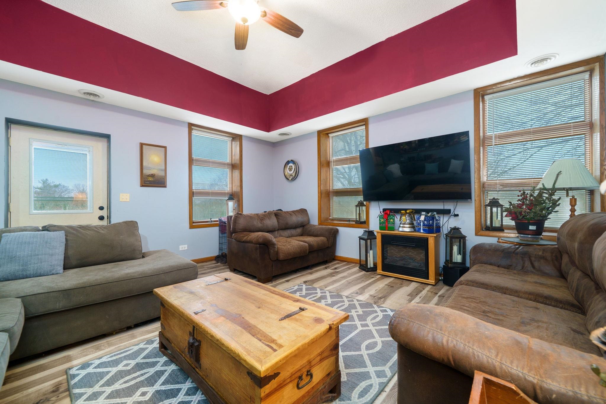 709 Franklin Street Oregon, IL 61061 - Photo 8 of 87 a living room with furniture and a flat screen tv