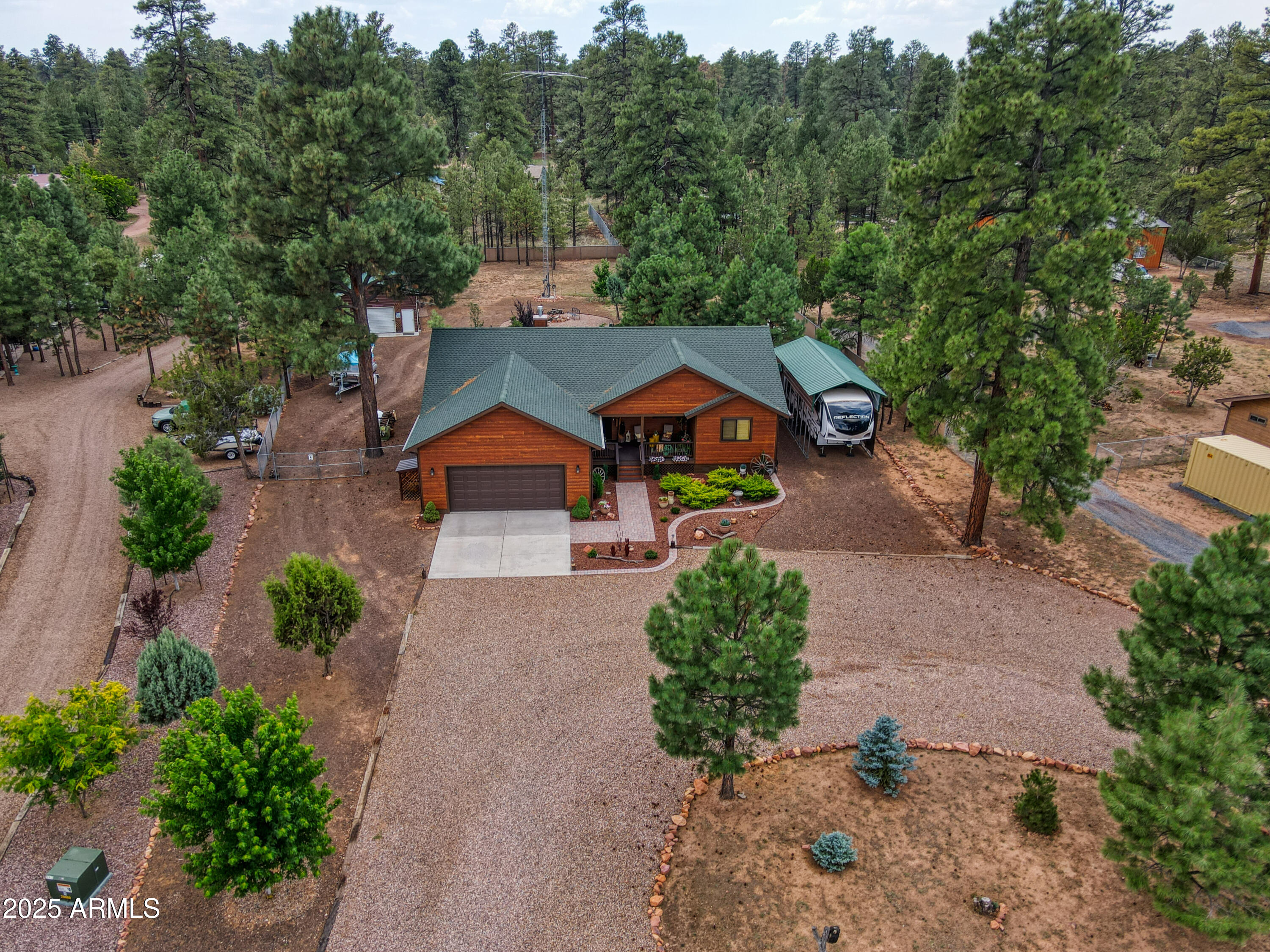 2050 Christmas Pine Road Overgaard, AZ 85933 - Photo 1 of 31 an aerial view of a house