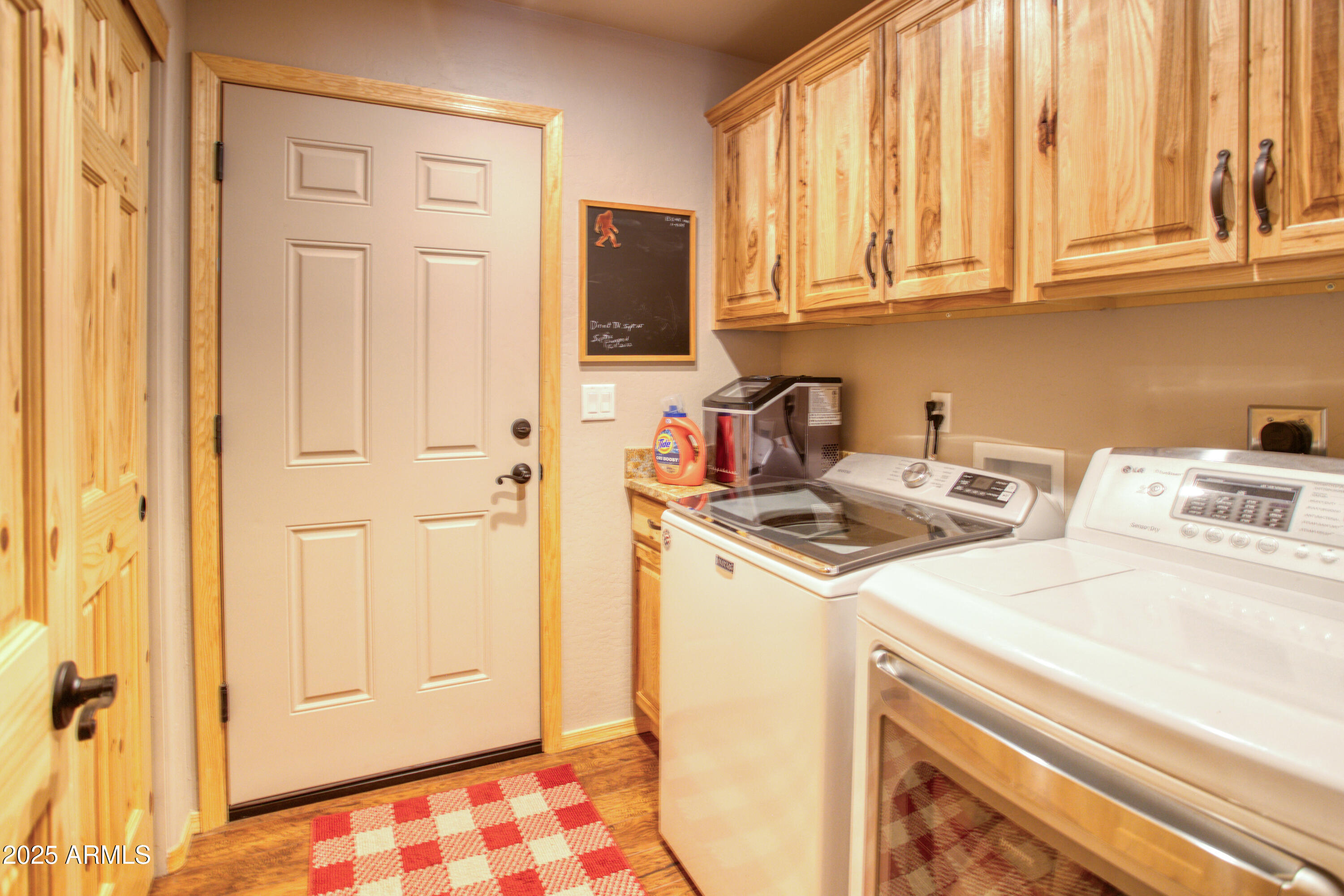 2050 Christmas Pine Road Overgaard, AZ 85933 - Photo 20 of 31 a utility room with dryer and washer
