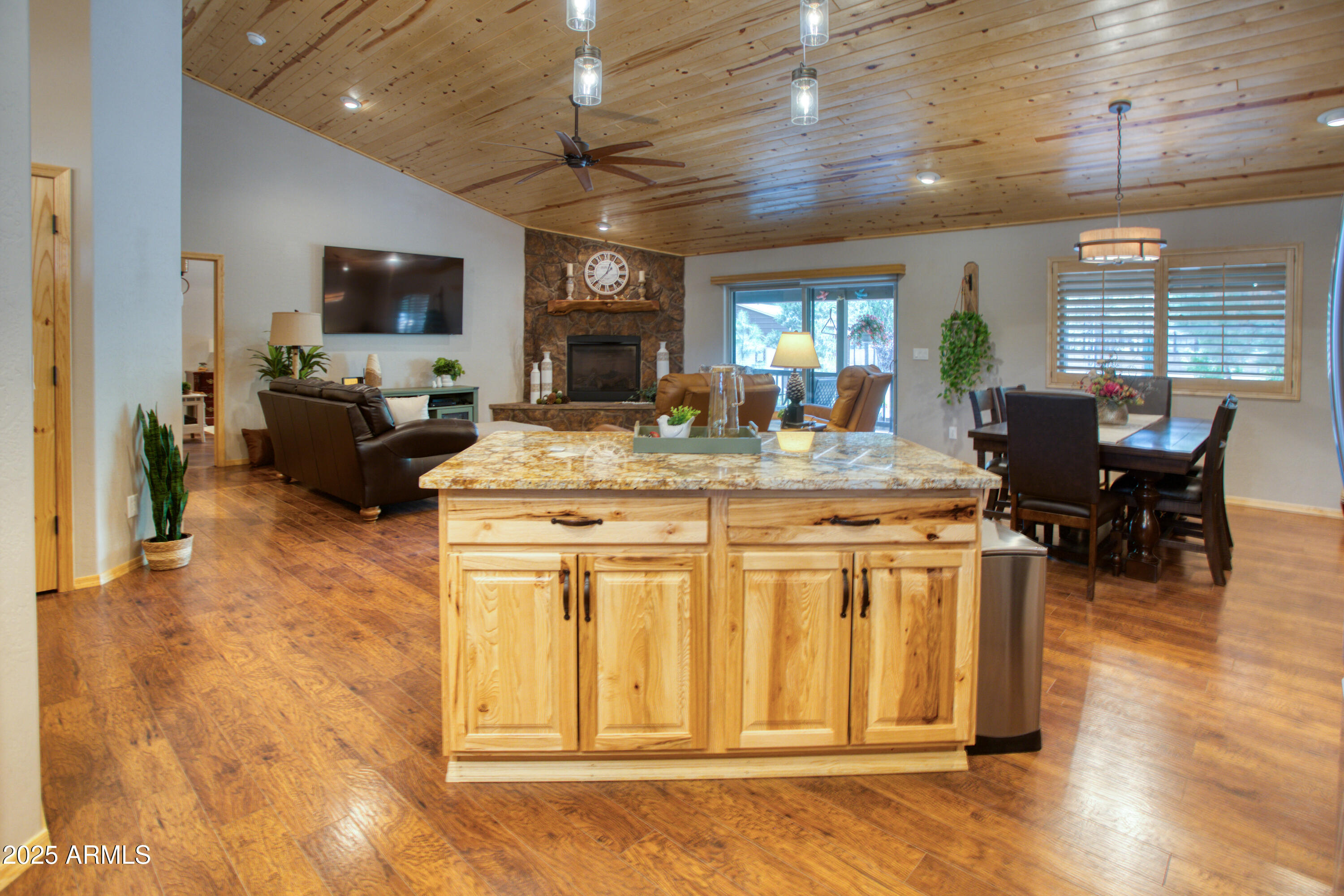 2050 Christmas Pine Road Overgaard, AZ 85933 - Photo 9 of 31 a view of a dining room with furniture window and wooden floor