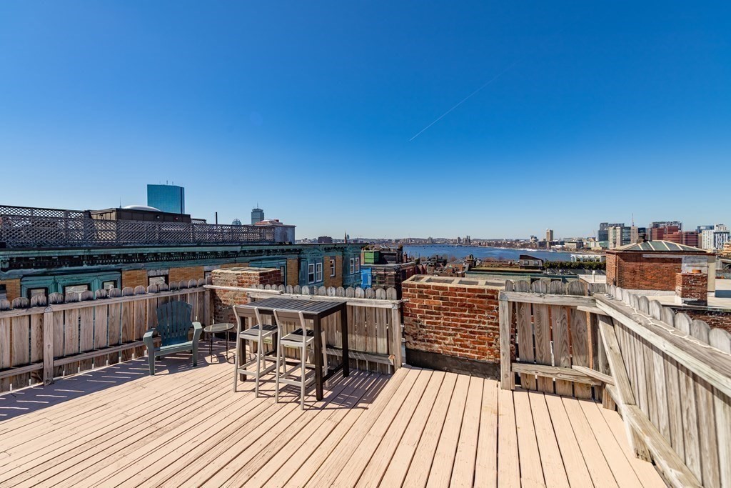 101 Myrtle Street, Unit A Boston, MA 02114 - Photo 15 of 15 a view of a terrace with chairs