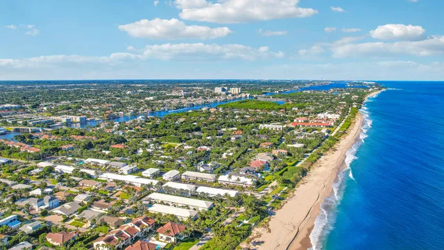 a view of a swimming pool with an outdoor seating