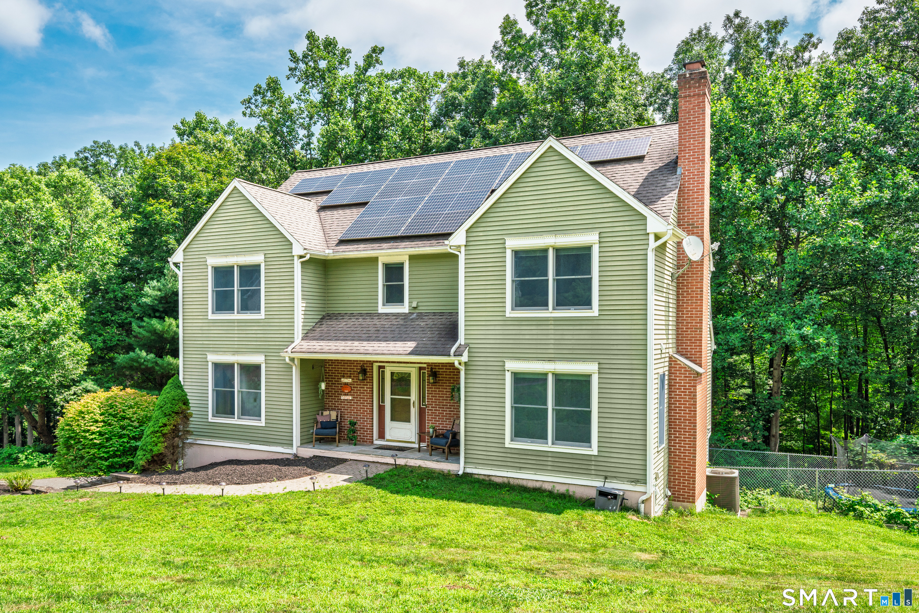 85 Wildewood Run Bristol, CT 06010 - Photo 1 of 29 a front view of a house with a yard