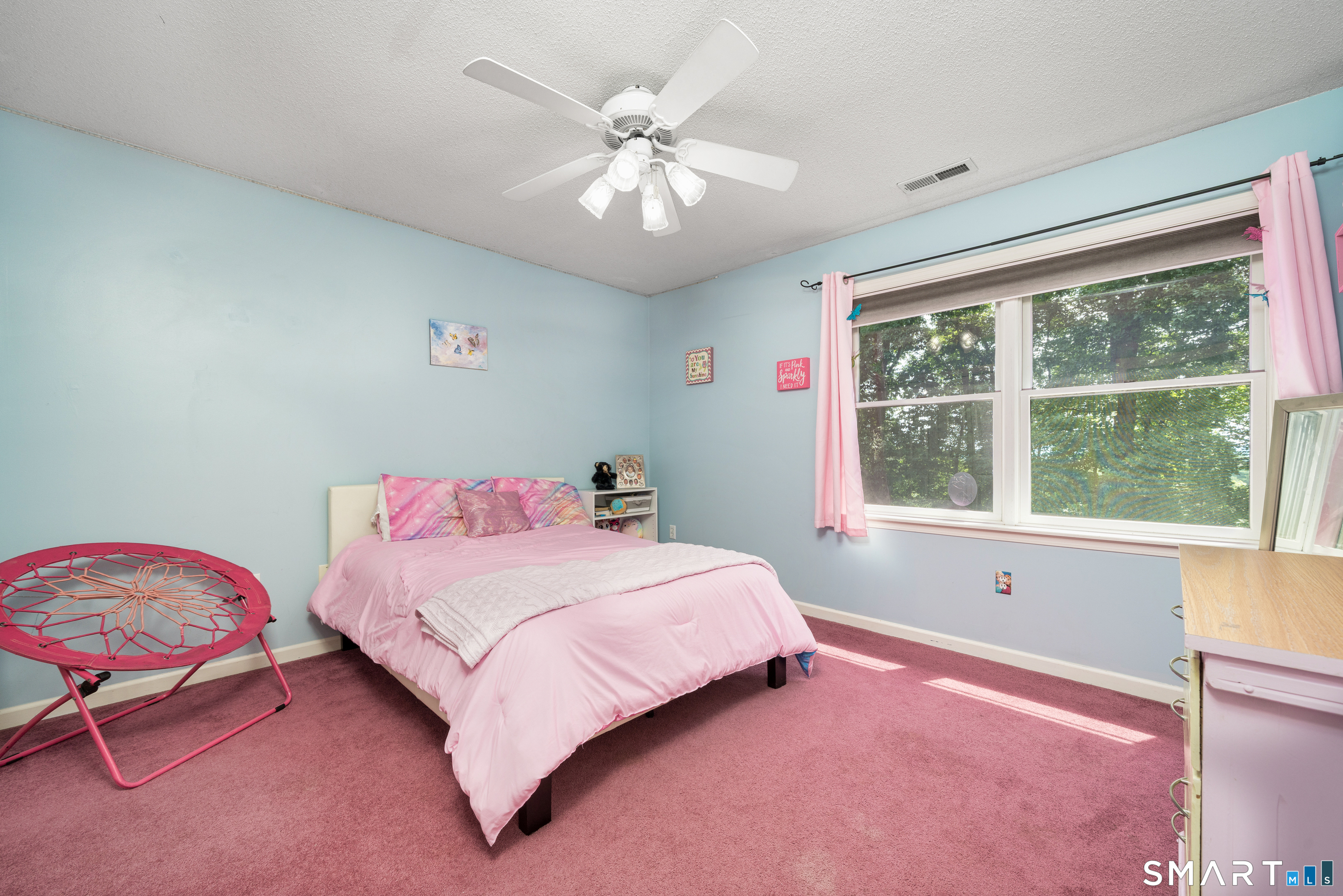 85 Wildewood Run Bristol, CT 06010 - Photo 16 of 29 a bedroom with a bed and a chandelier