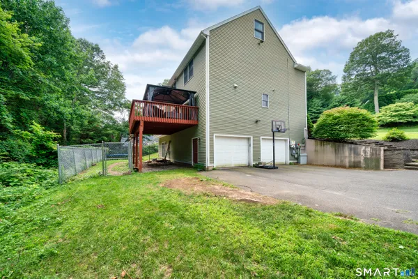 a view of a back yard of the house