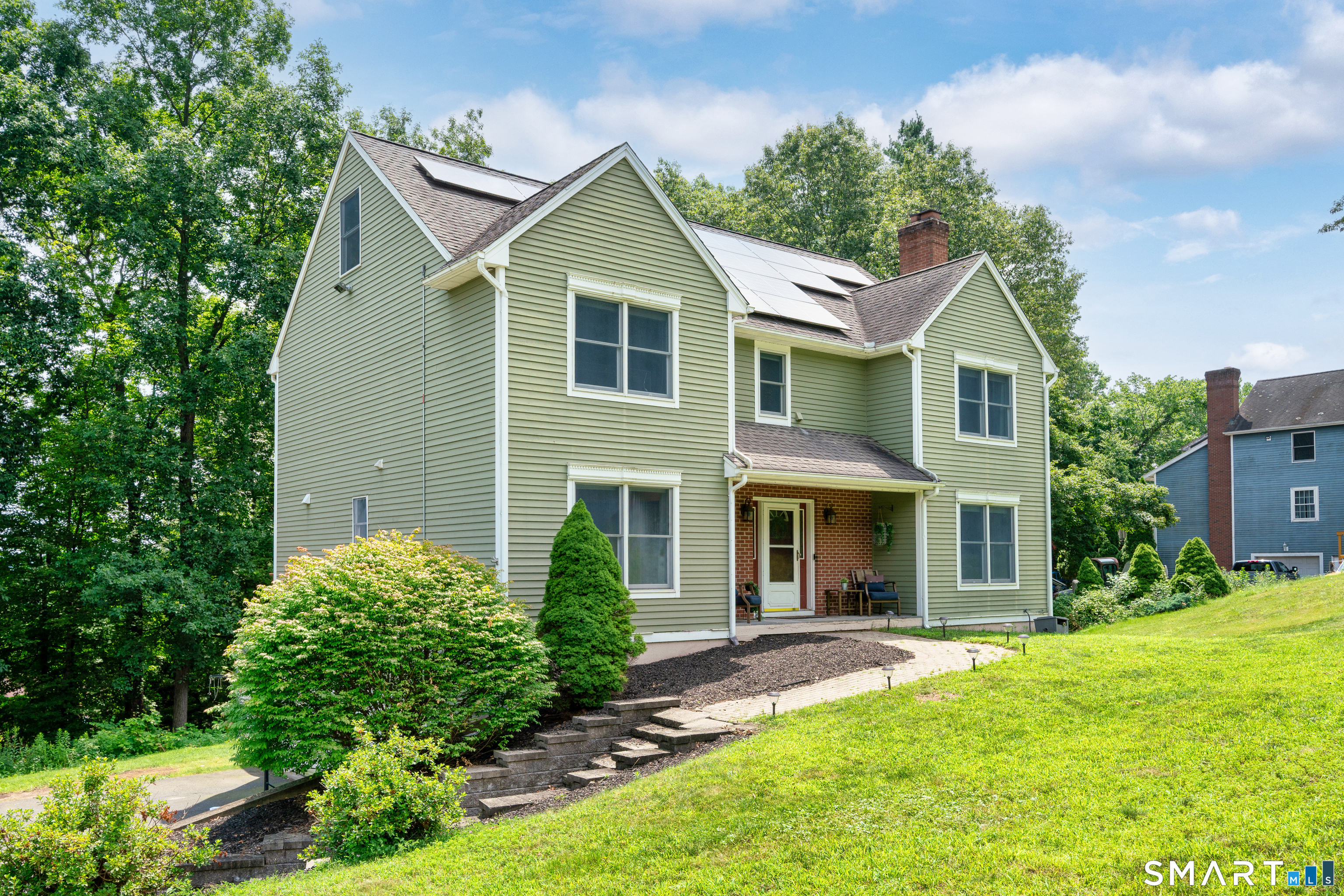85 Wildewood Run Bristol, CT 06010 - Photo 28 of 29 front view of a house with a yard