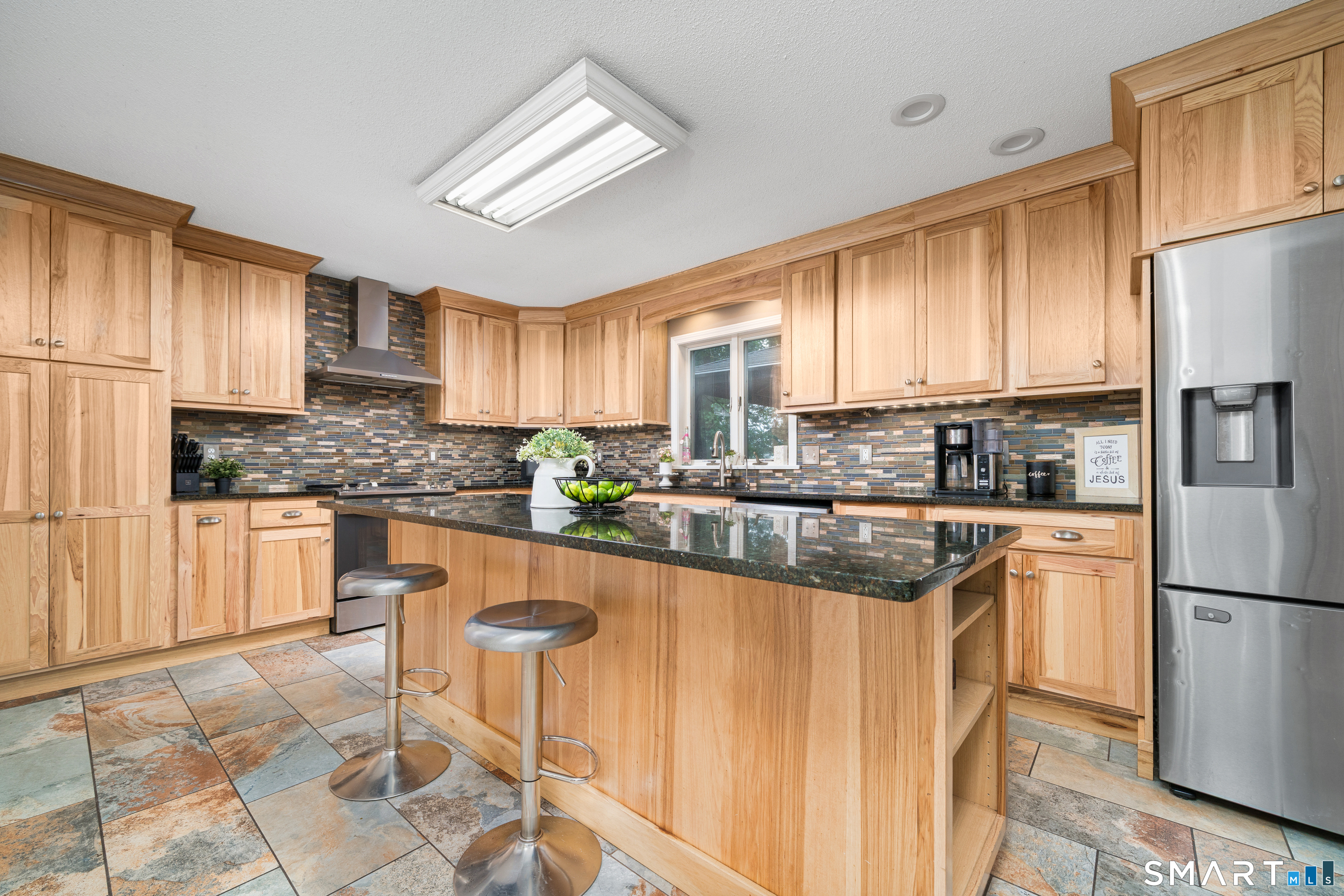 85 Wildewood Run Bristol, CT 06010 - Photo 5 of 29 a kitchen with granite countertop a refrigerator stove top oven and sink