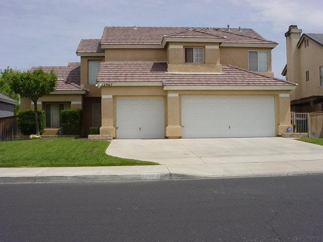 12967 Dusty Road Victorville, CA 92392 - Photo 1 of 1 a house view with a garden space