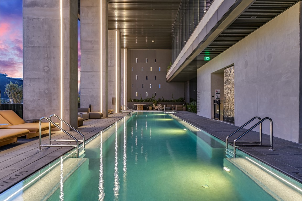 610 Davis Street, Unit 4201 Austin, TX 78701 - Photo 28 of 40 Indoor pool featuring a patio