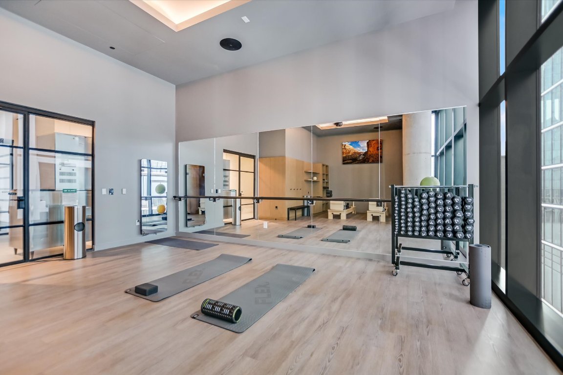 610 Davis Street, Unit 4201 Austin, TX 78701 - Photo 33 of 40 Common area with a towering ceiling
