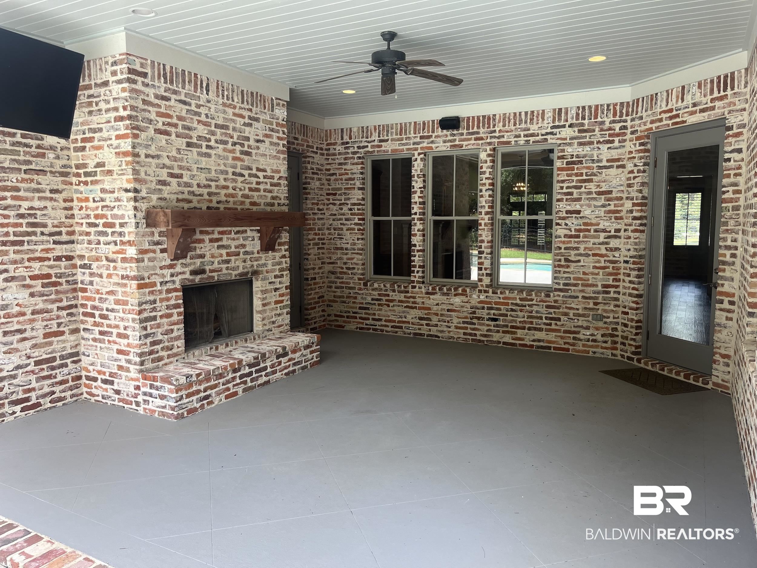 565 Falling Water Boulevard Fairhope, AL 36532 - Photo 6 of 27 View of patio / terrace featuring ceiling fan