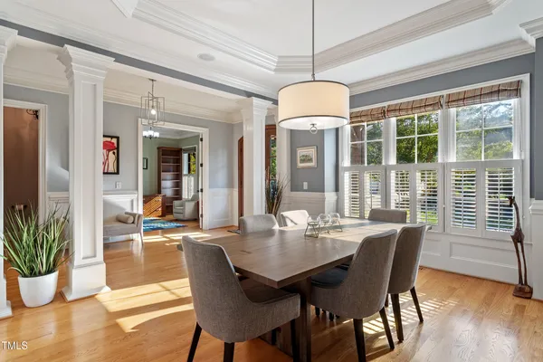 a kitchen with a sink stove and wooden cabinets