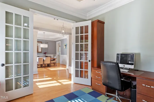 a kitchen with stainless steel appliances kitchen island granite countertop a sink and cabinets