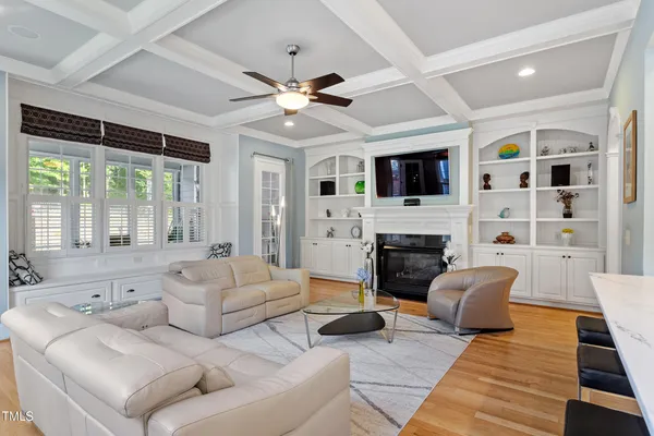 a bedroom with a bed and a table