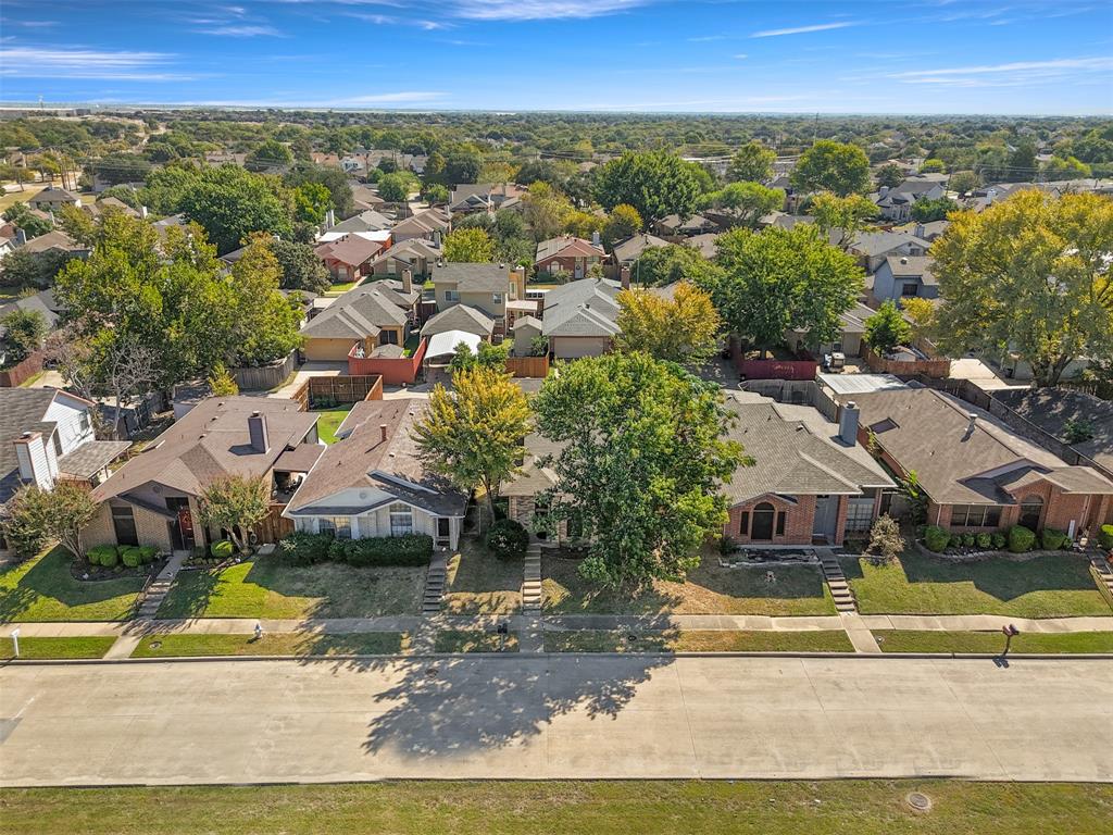 420 Seminary Ridge Mesquite, TX 75149 - Photo 31 of 36 an aerial view of residential houses with outdoor space and swimming pool