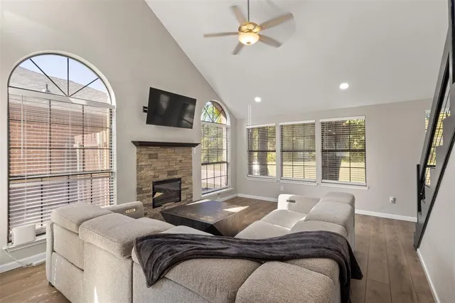 a bedroom with a bed and a fireplace