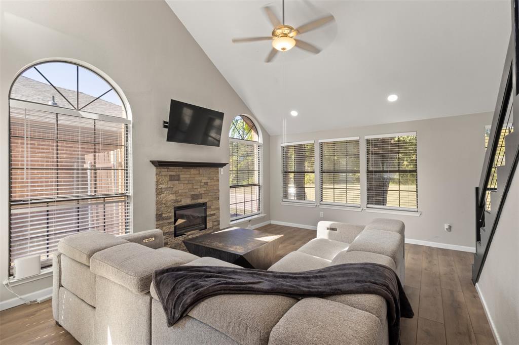 420 Seminary Ridge Mesquite, TX 75149 - Photo 6 of 36 a bedroom with a bed and a fireplace