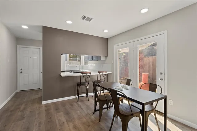 a workspace with furniture and wooden floor