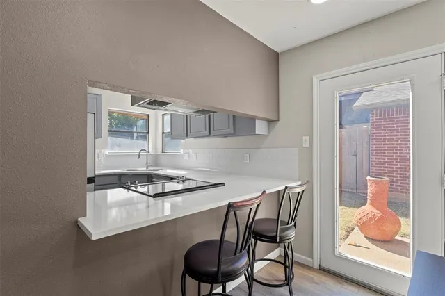 a table and chairs in a kitchen