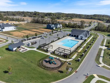 an aerial view of a house with a garden