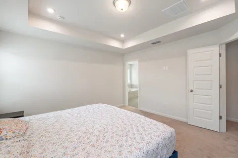 a white bath tub sitting next to a window