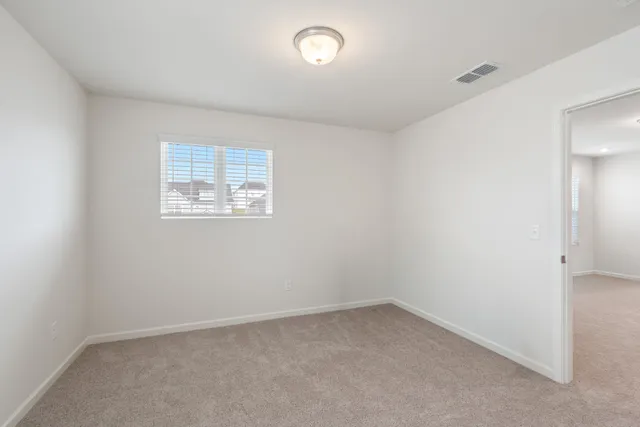 a view of a workspace with furniture