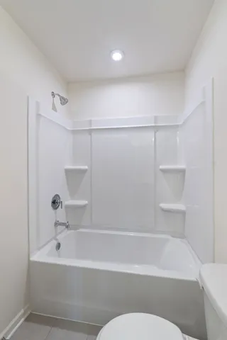 a view of multiple houses with a yard