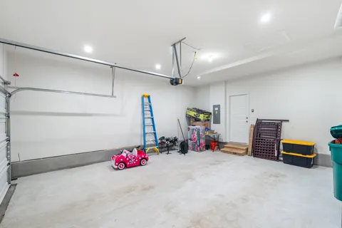 an aerial view of residential houses with a city view