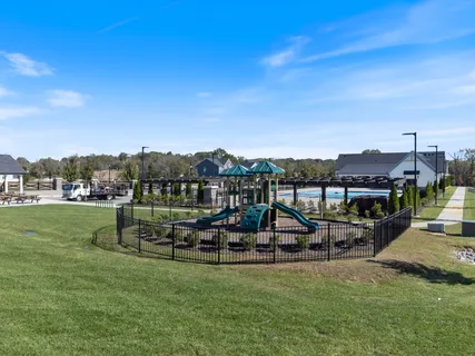 a view of a house with a big yard