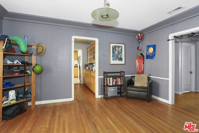 a view of livingroom with furniture and wooden floor