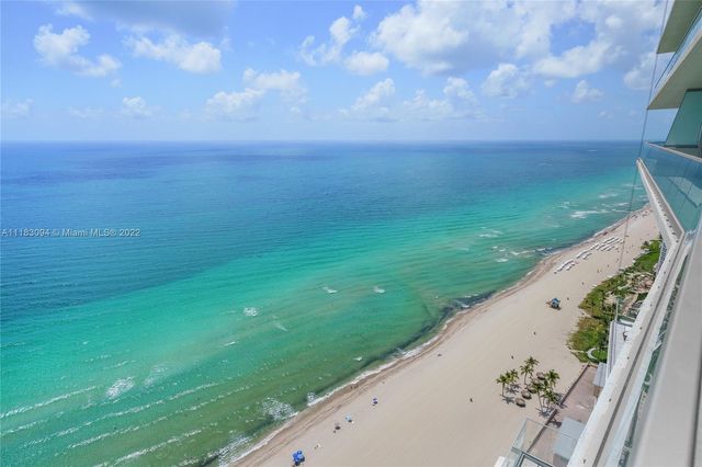 a view of a field with an outdoor space