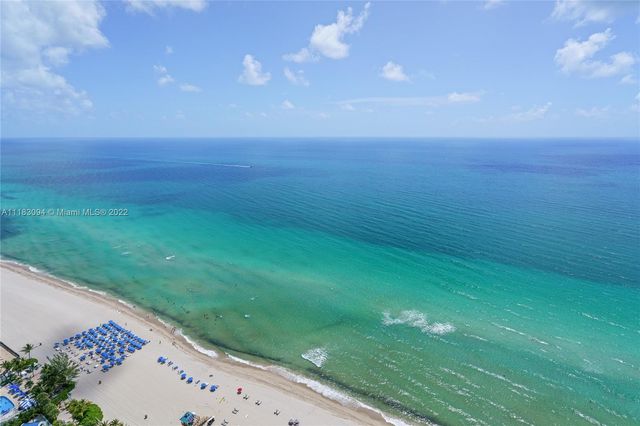 a view of yard with ocean view