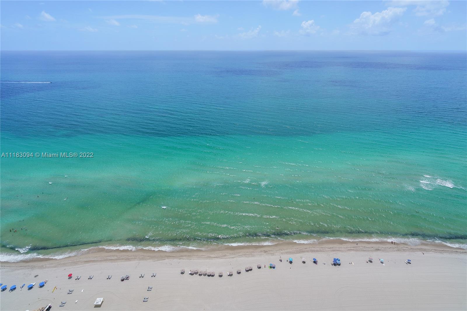18501 Collins Avenue, Unit 3302 Sunny Isles Beach, FL 33160 - Photo 27 of 48 a view of a field with an ocean