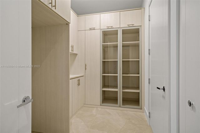 a view of an empty walk in closet