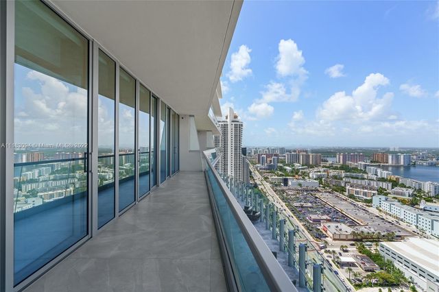 a view of a balcony with city view