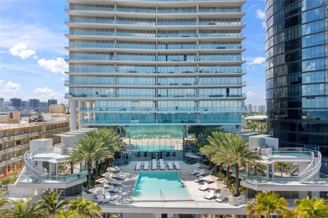 a view of a tall building from the patio