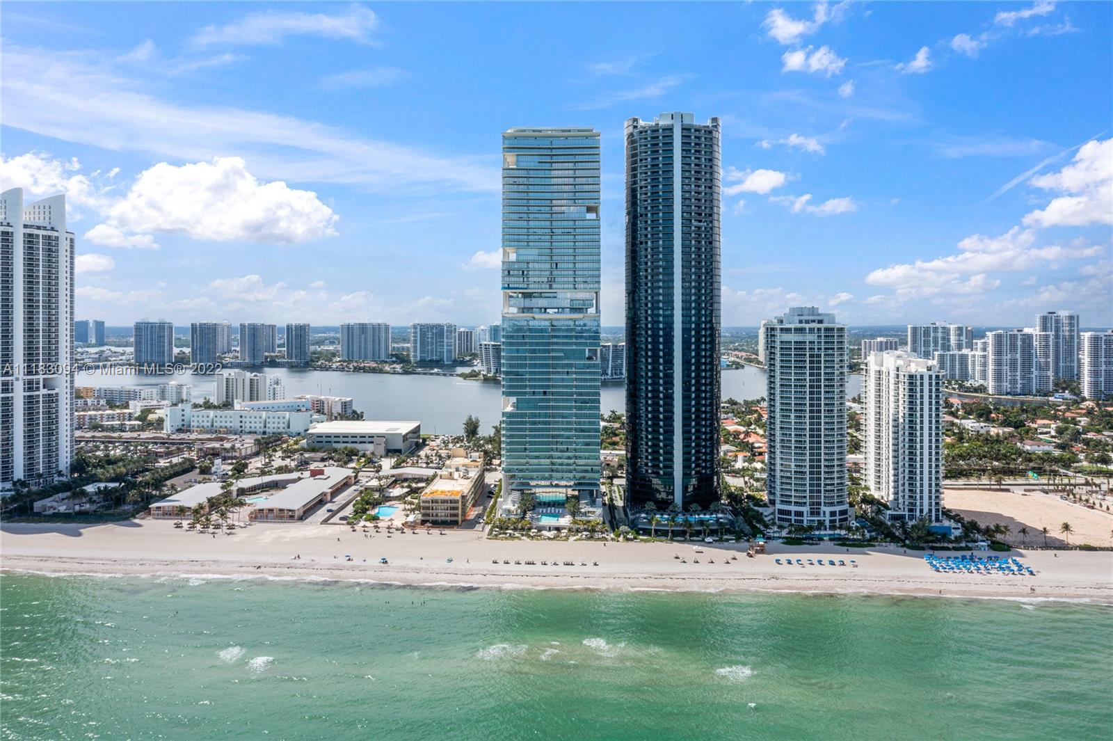 18501 Collins Avenue, Unit 3302 Sunny Isles Beach, FL 33160 - Photo 45 of 48 a view of a city with tall buildings