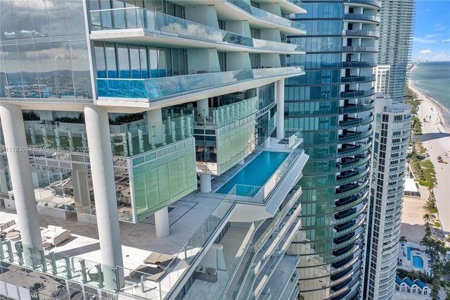 a view of a balcony with plants
