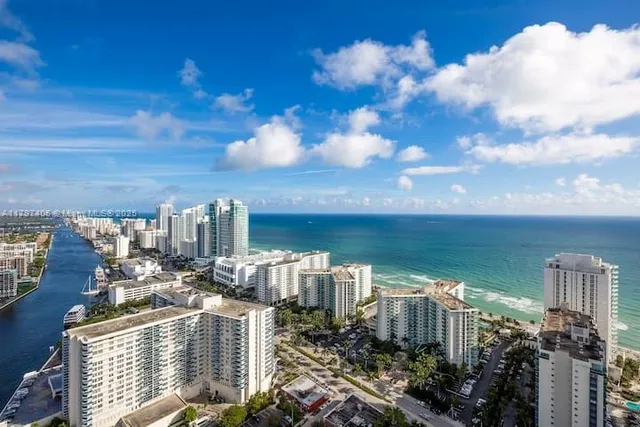 a view of a lake with building in front of it