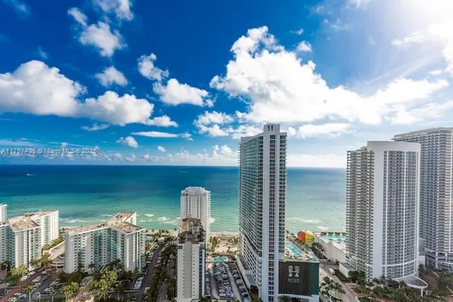 a view of a chairs with potted plants
