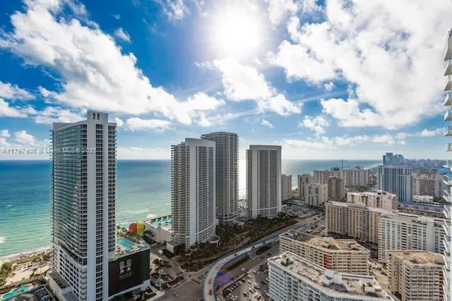 a patio with table and chairs