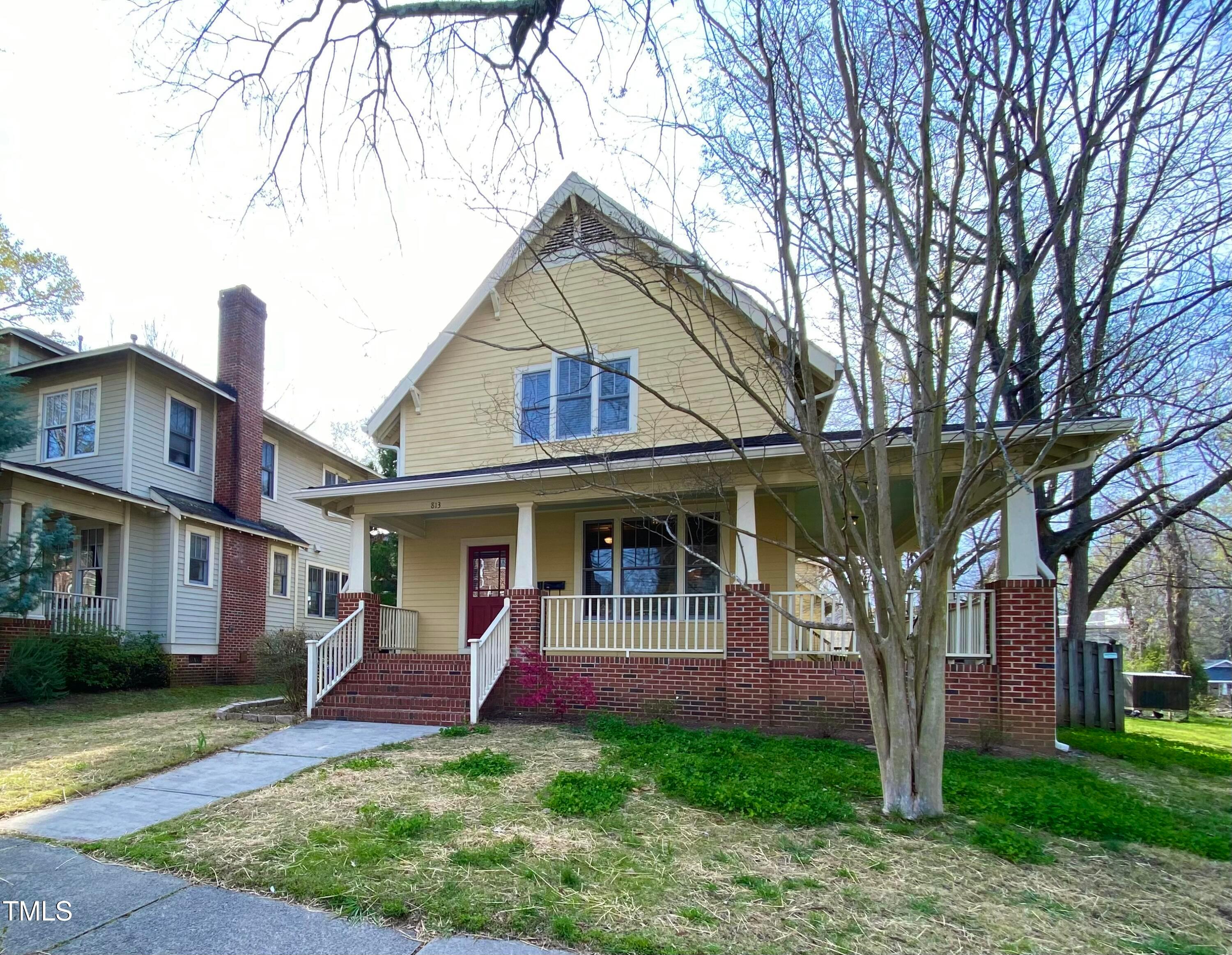 813 Clarendon Street Durham, NC 27705 - Photo 1 of 36 front view of a house with a yard