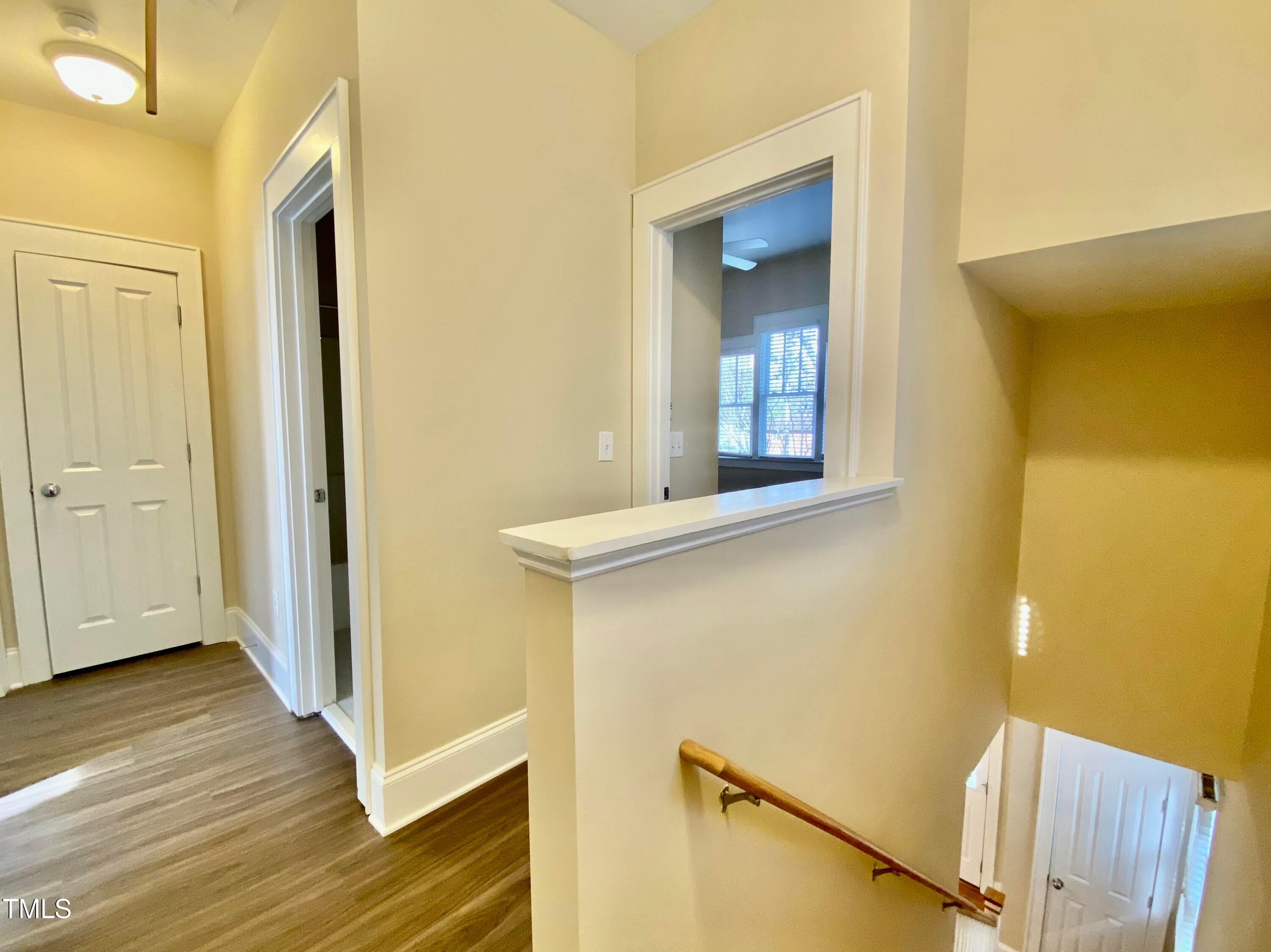 813 Clarendon Street Durham, NC 27705 - Photo 23 of 36 a view of a hallway with wooden floor