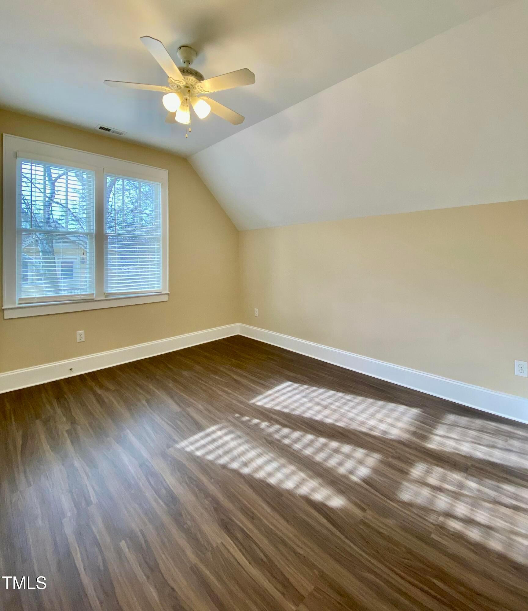 813 Clarendon Street Durham, NC 27705 - Photo 29 of 36 wooden floor in an empty room with a window