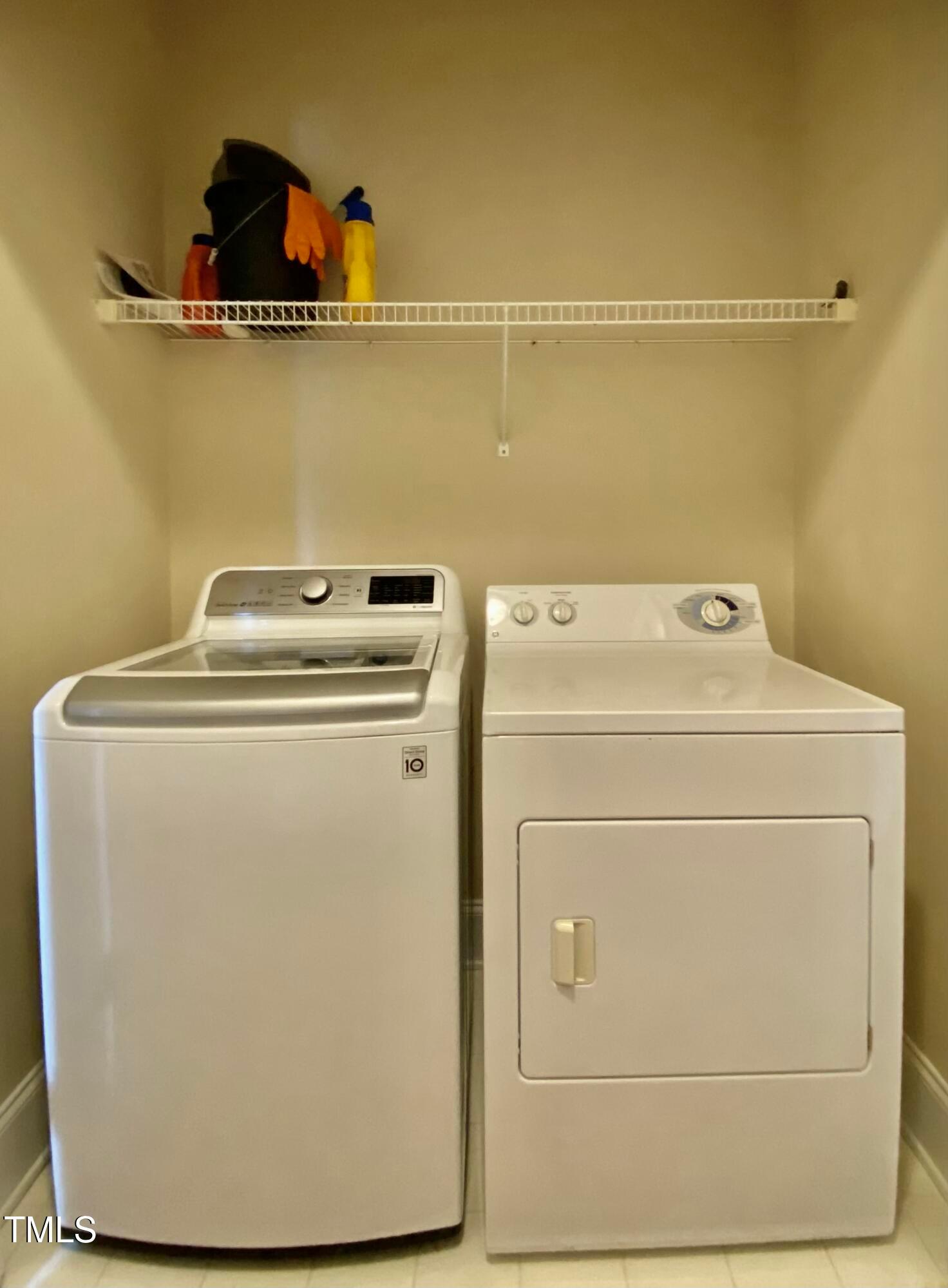 813 Clarendon Street Durham, NC 27705 - Photo 10 of 36 a utility room with dryer and washer