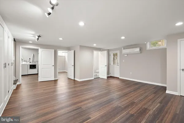 a view of a swimming pool with a yard