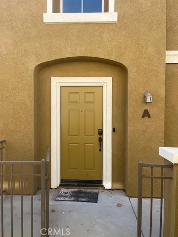 a front view of a house with a door