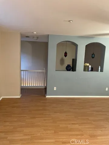 a view of a living room with furniture