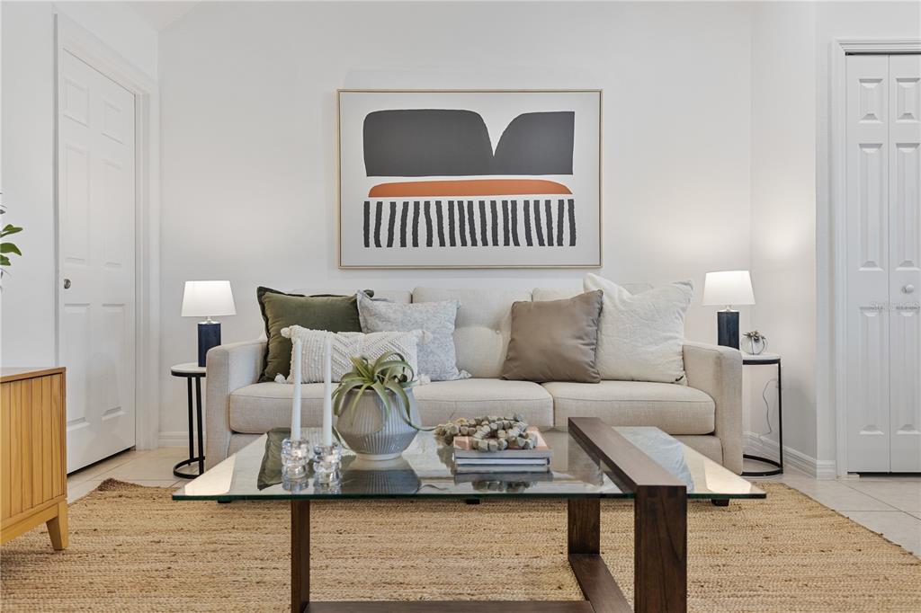 34217 Cinder Way Wesley Chapel, FL 33545 - Photo 11 of 27 a living room with furniture and a window